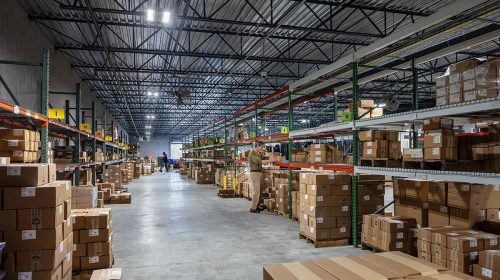 High-capacity warehouse storage facility for construction materials with organized shelving and inventory management.