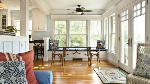 Barrington Victorian sunroom and breakfast area renovation with hardwood floors and large windows